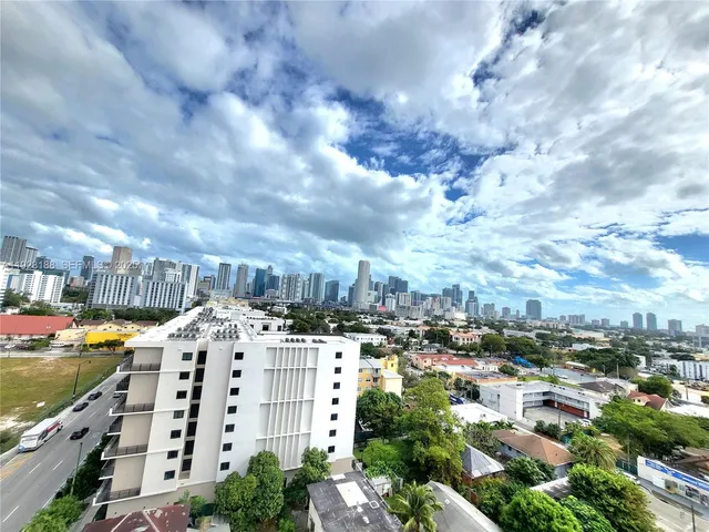 a view of a city with tall buildings