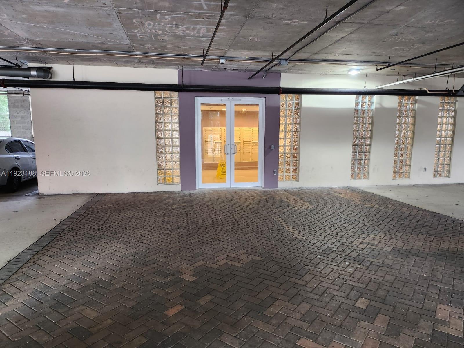 120 Southwest 8th Avenue, Unit 802 Miami, FL 33130 - Photo 22 of 30 a view of an empty room with a window