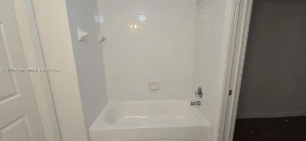 a close up of a bathtub