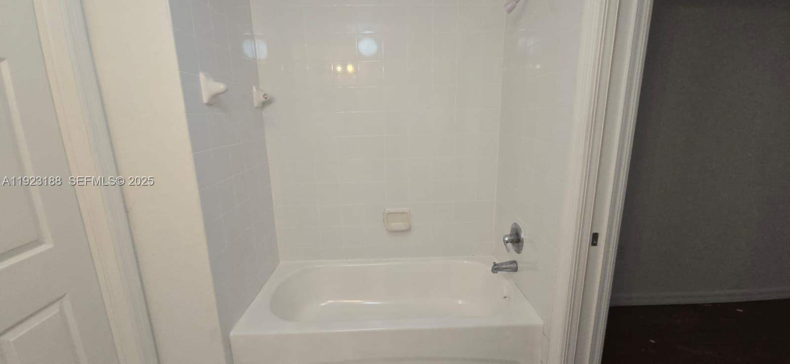 120 Southwest 8th Avenue, Unit 802 Miami, FL 33130 - Photo 29 of 31 a close up of a bathtub