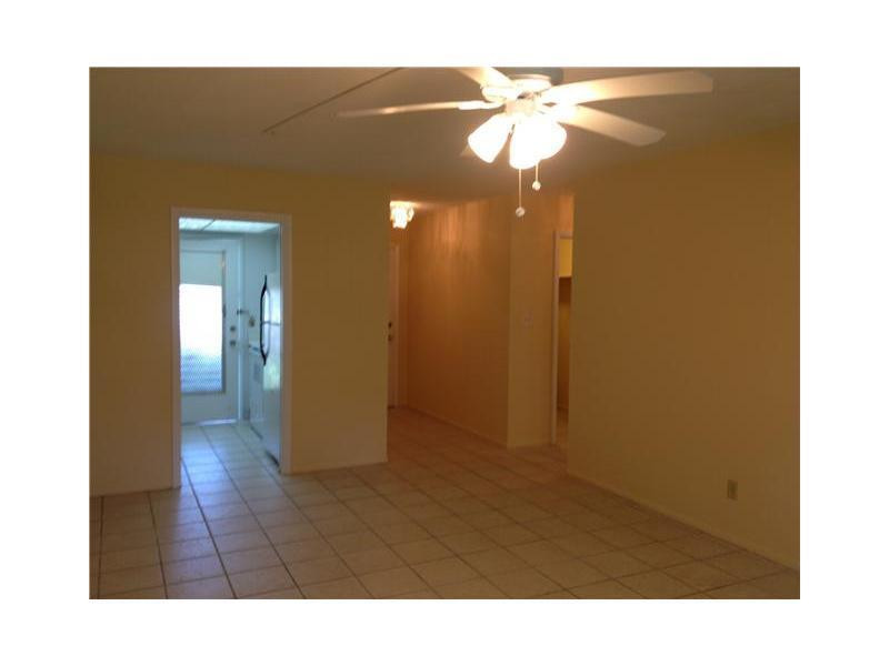 1150 East Sample Road, Unit 109B Pompano Beach, FL 33064 - Photo 3 of 3 Exterior Front
