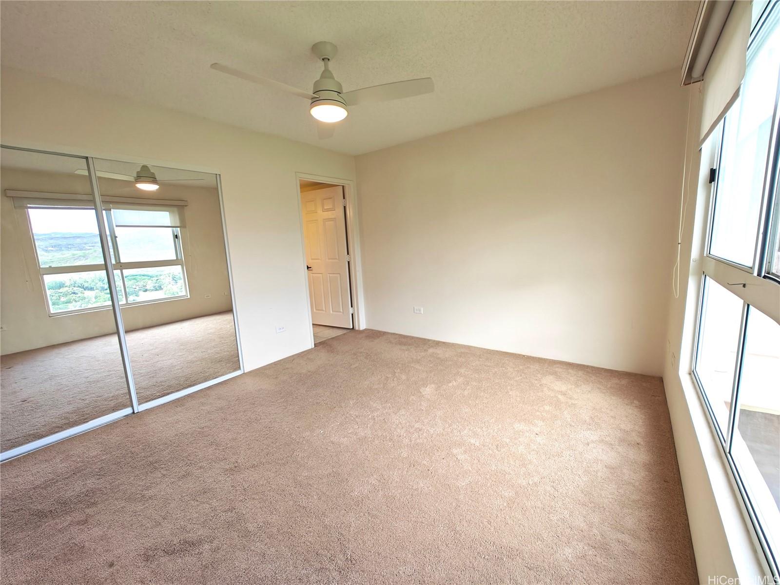 3054 Ala Poha Place, Unit 2005 Honolulu, HI 96818 - Photo 11 of 22 an empty room with window