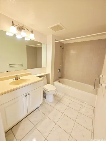 an empty room with a window and doors