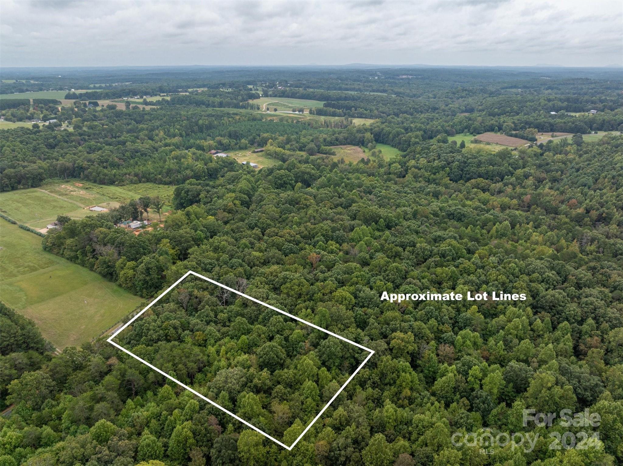 0 John Beam Road Vale, NC 28168 - Photo 2 of 15 a view of a city from a lake
