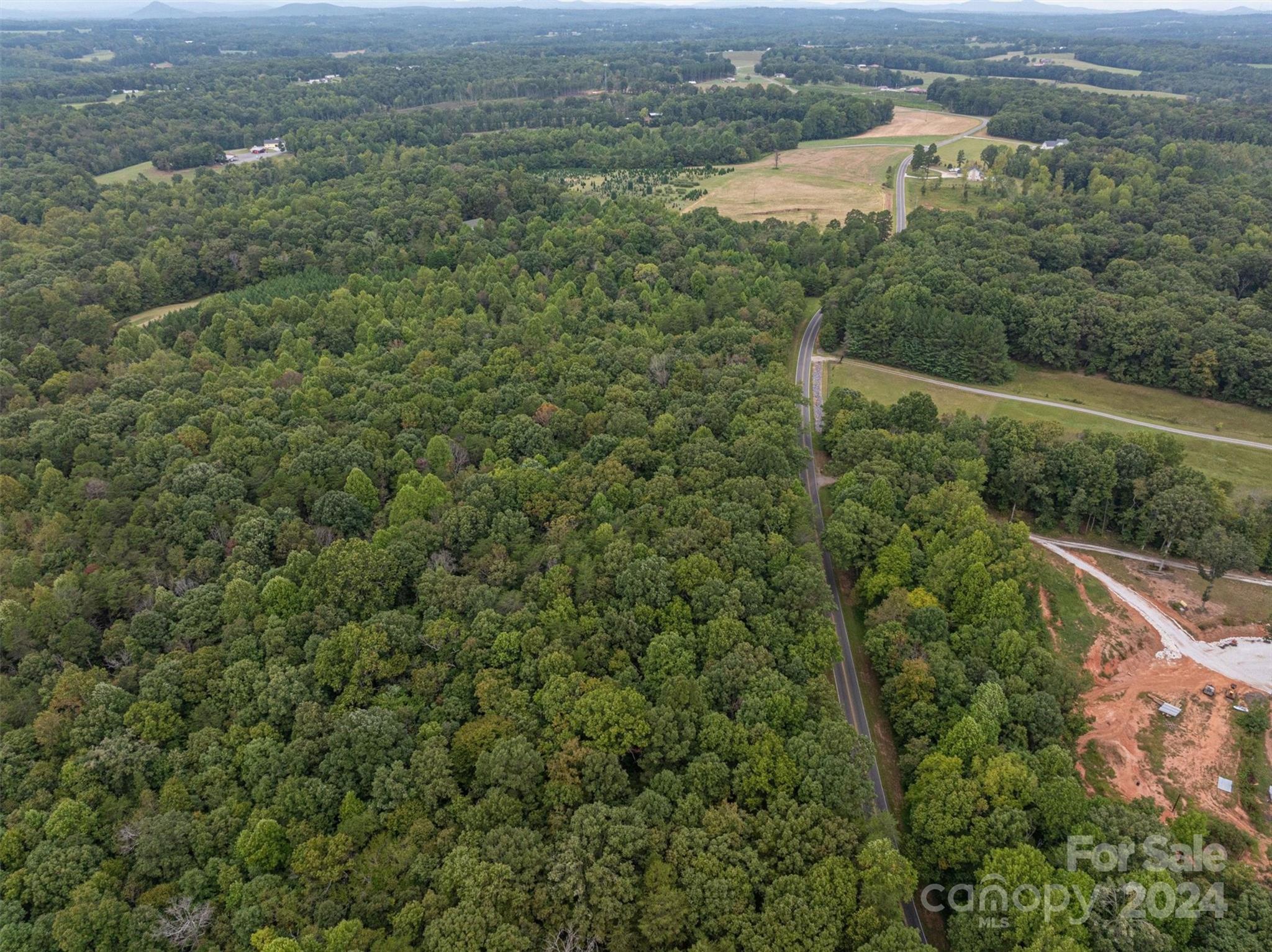 0 John Beam Road Vale, NC 28168 - Photo 6 of 15 an aerial view of residential houses with outdoor space and trees