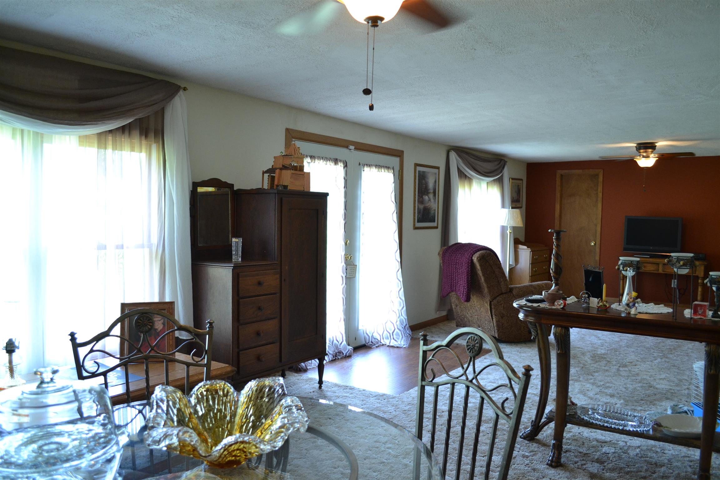 120 Rankin Road Hartsville, TN 37074 - Photo 5 of 20 HOME HAS AN ADDITION USED AS A LARGE REC ROOM; HAS DOUBLE DOOR ONTO PATIO LOOKING OUT TO 5 BEAUTIFUL ACRES