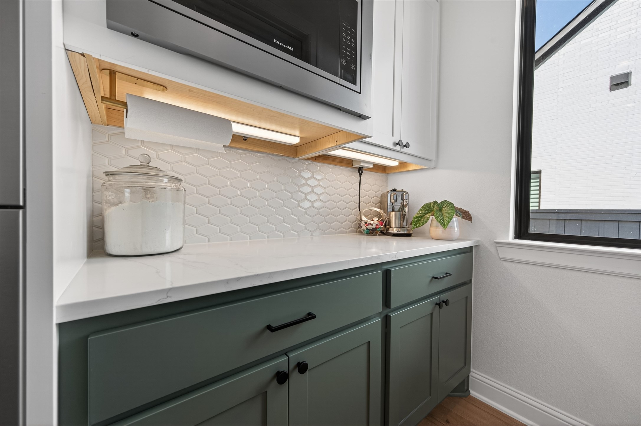 175 Shoveler Duck Way Magnolia, TX 77354 - Photo 12 of 47 a kitchen with a sink and cabinets