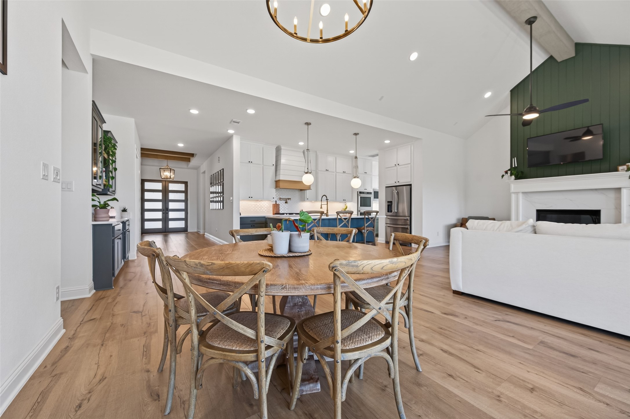 175 Shoveler Duck Way Magnolia, TX 77354 - Photo 16 of 47 a view of a dining room with furniture and wooden floor