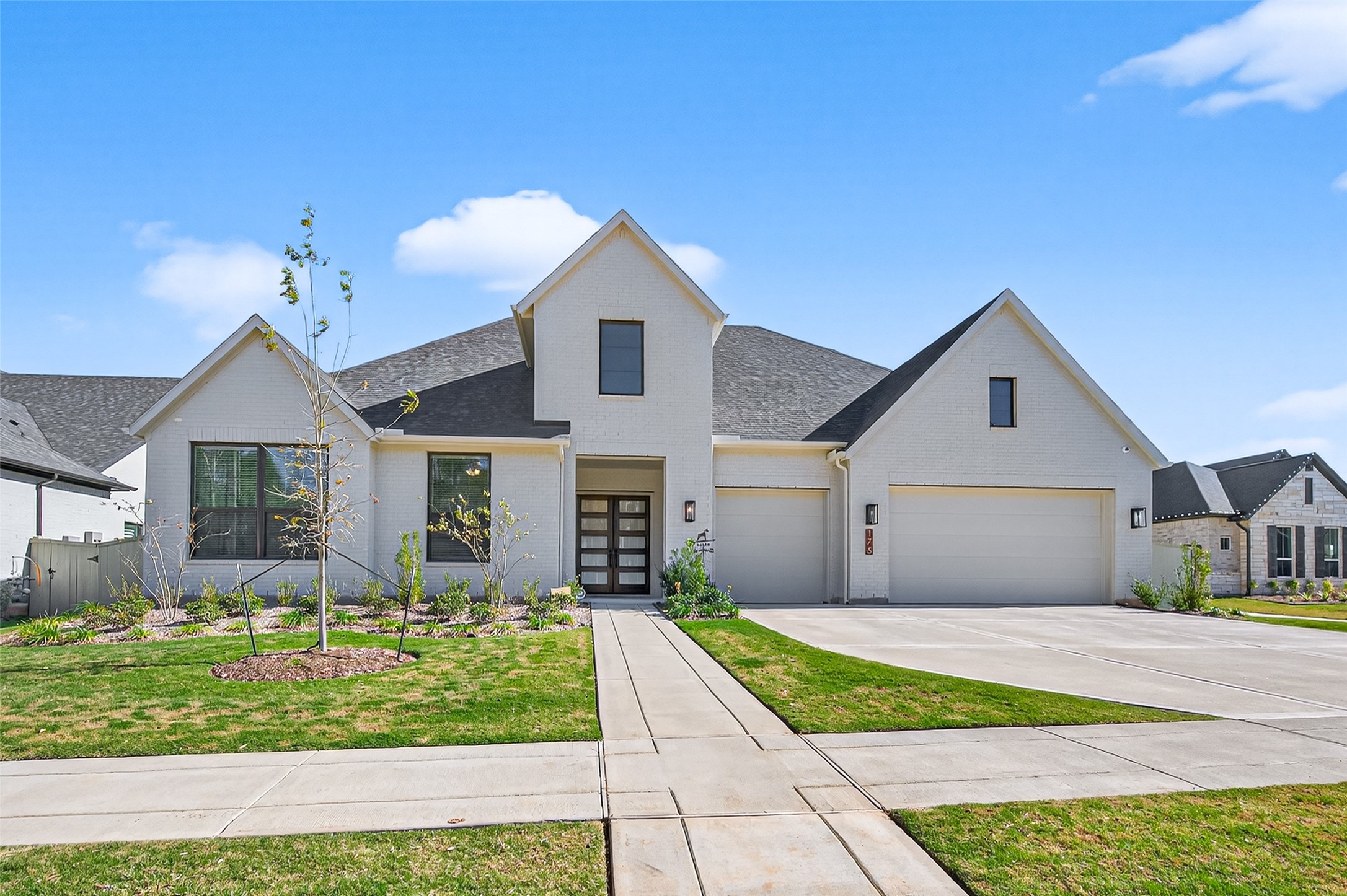 175 Shoveler Duck Way Magnolia, TX 77354 - Photo 2 of 47 a front view of a house with garden