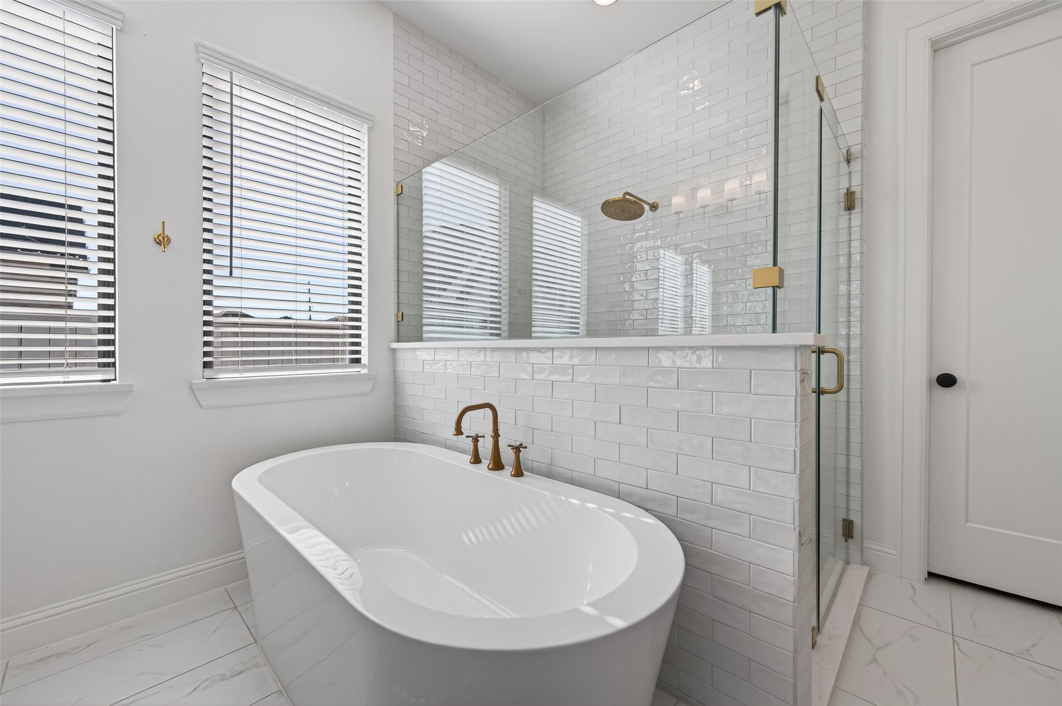 175 Shoveler Duck Way Magnolia, TX 77354 - Photo 26 of 47 a bathroom with a sink and a mirror