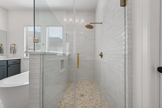 a bathroom with a sink and mirror