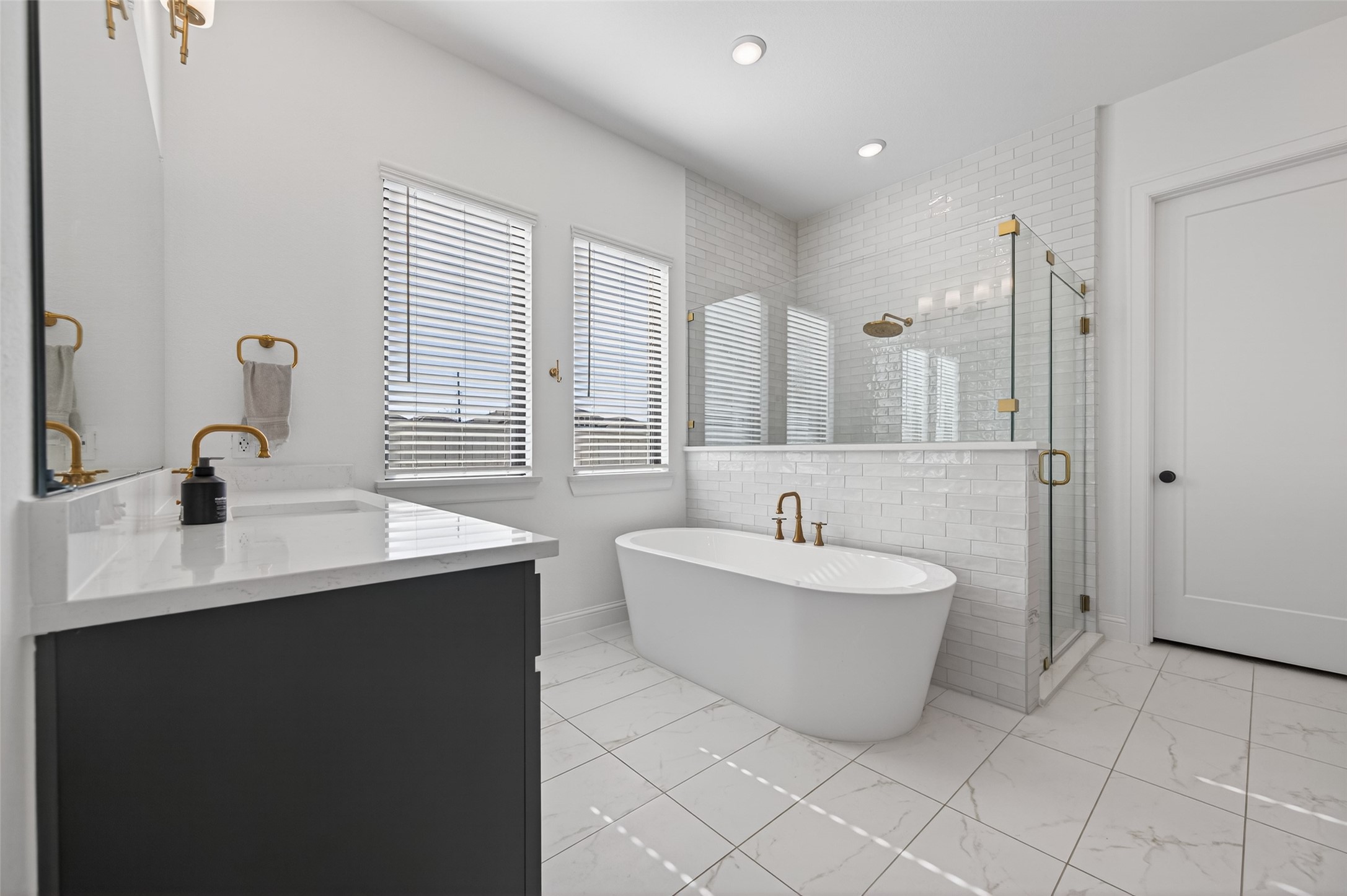 175 Shoveler Duck Way Magnolia, TX 77354 - Photo 30 of 47 a bathroom with a sink and mirror