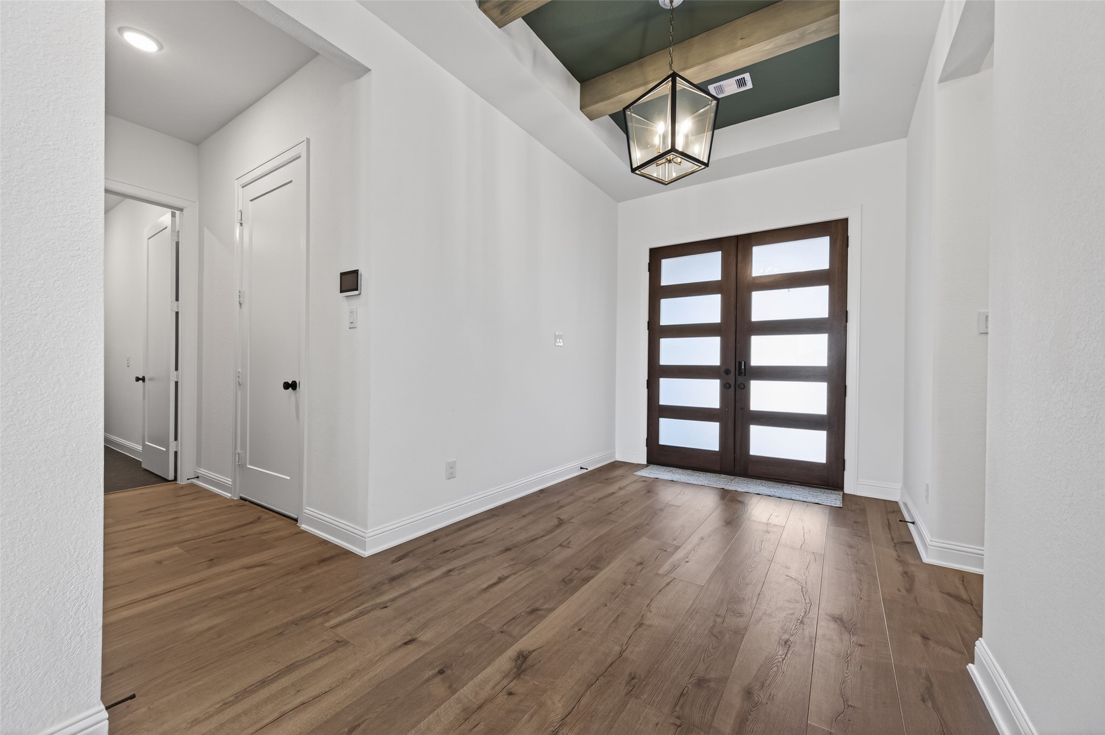 175 Shoveler Duck Way Magnolia, TX 77354 - Photo 4 of 47 wooden floor in an empty room