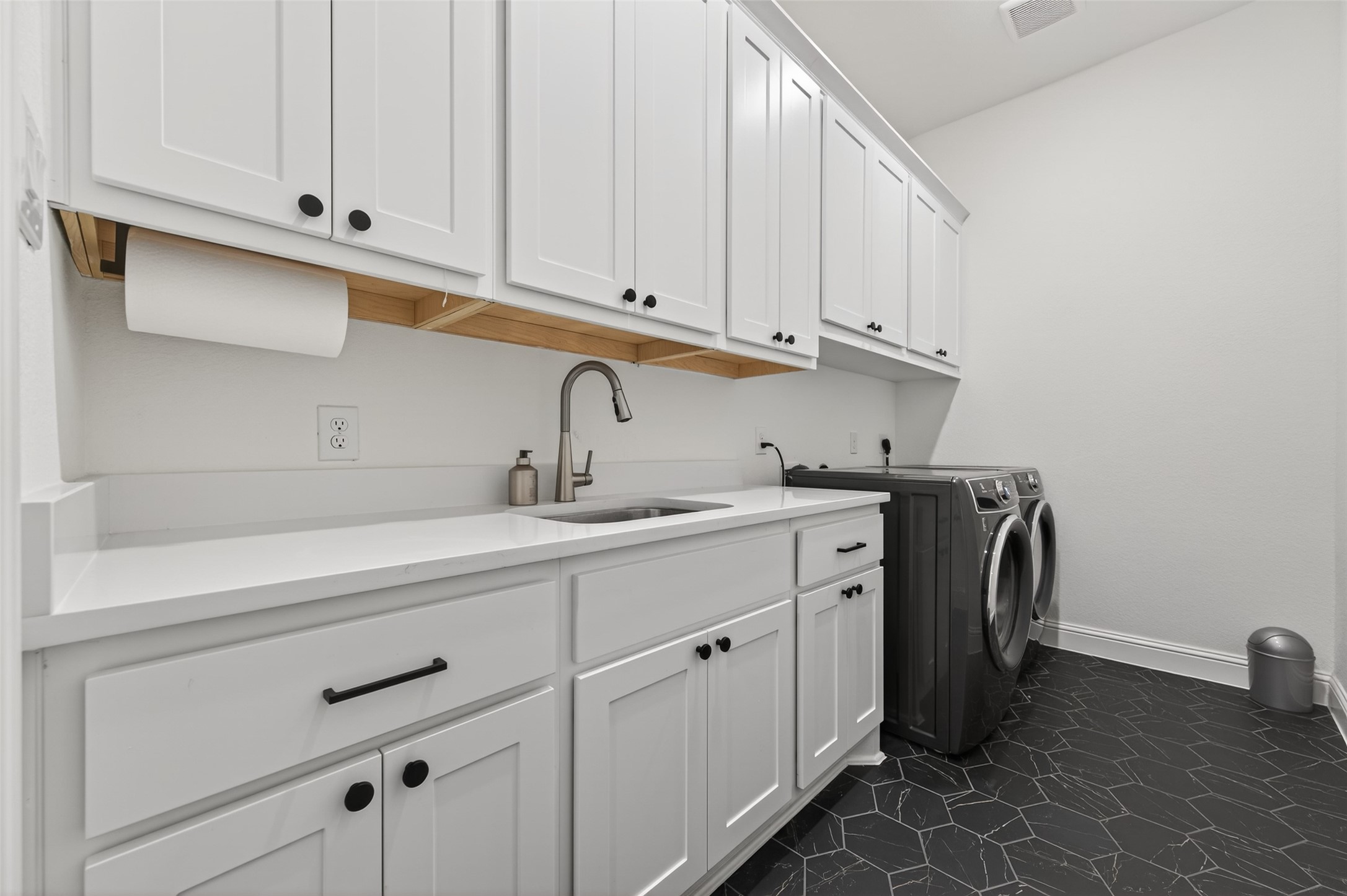 175 Shoveler Duck Way Magnolia, TX 77354 - Photo 43 of 47 a view with cabinets a sink and dishwasher