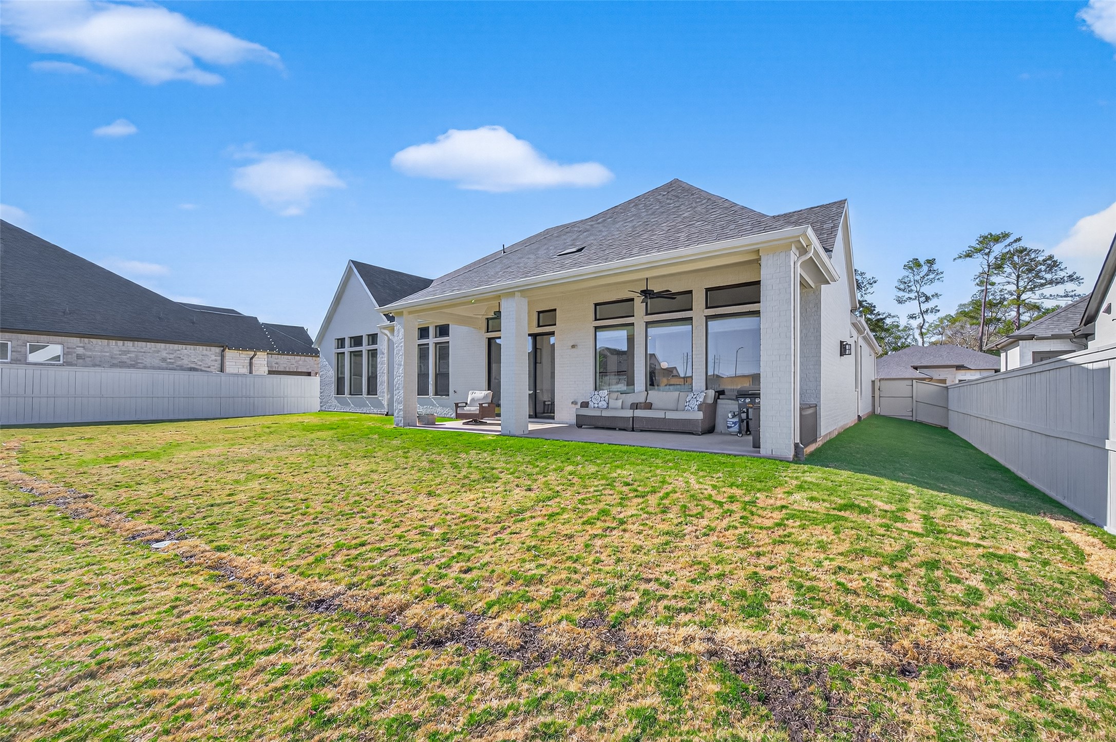 175 Shoveler Duck Way Magnolia, TX 77354 - Photo 45 of 47 a view of a house with a backyard