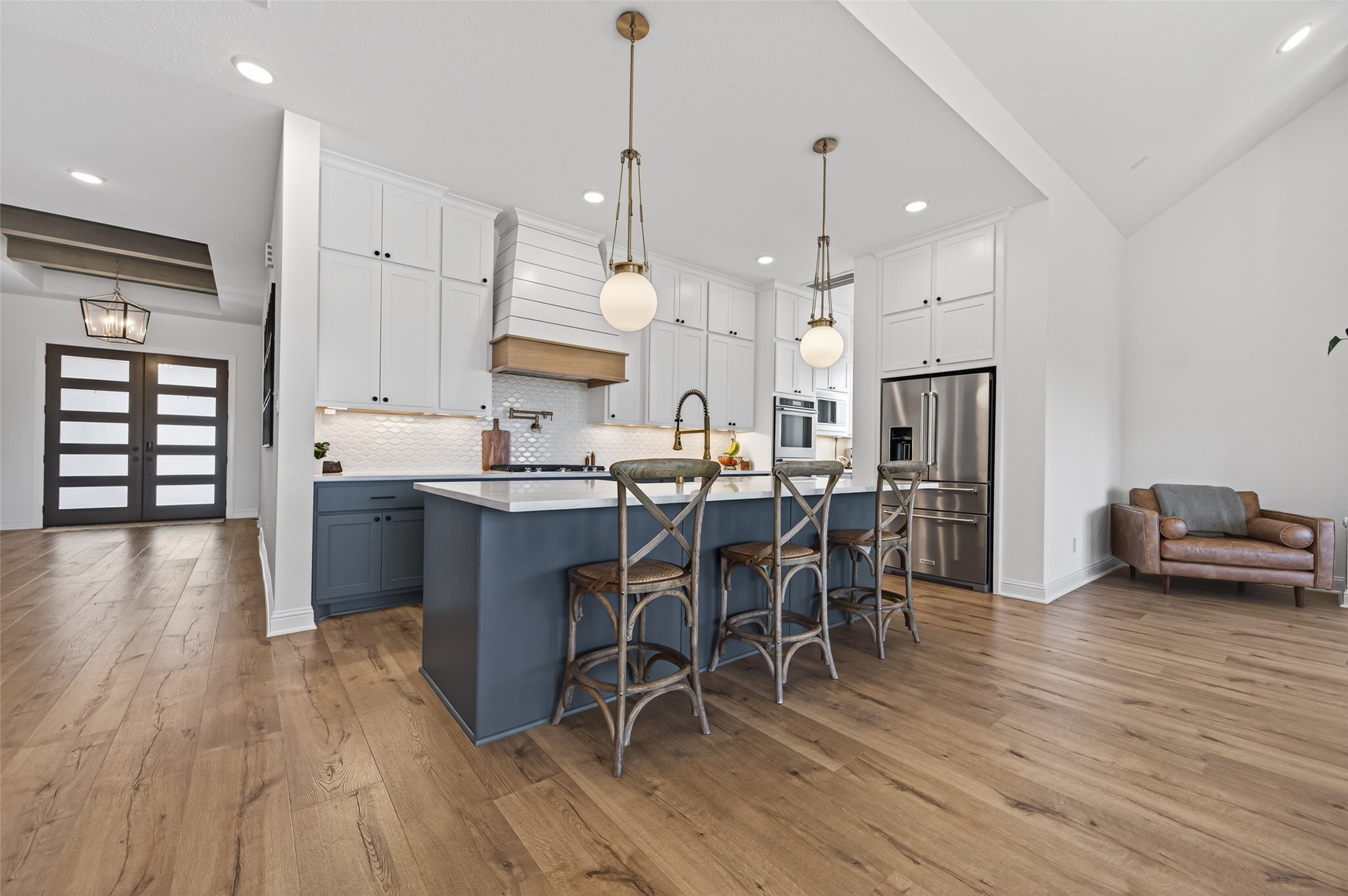 175 Shoveler Duck Way Magnolia, TX 77354 - Photo 5 of 47 a large kitchen with a table and chairs