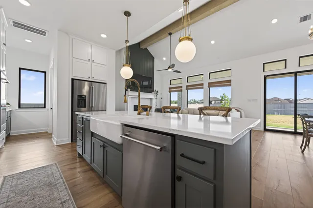 a kitchen with counter top space and a sink