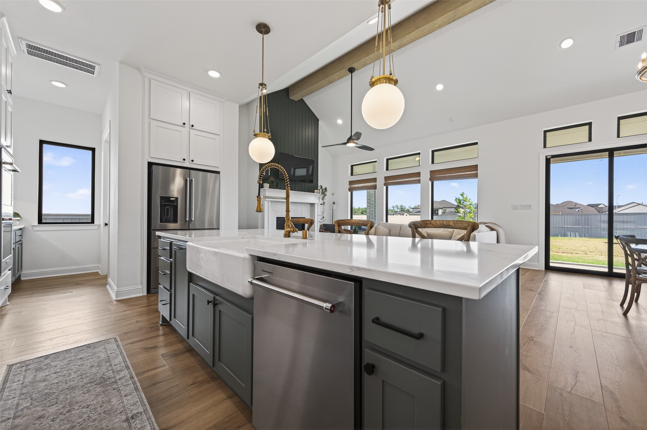 175 Shoveler Duck Way Magnolia, TX 77354 - Photo 9 of 47 a kitchen with counter top space and a sink