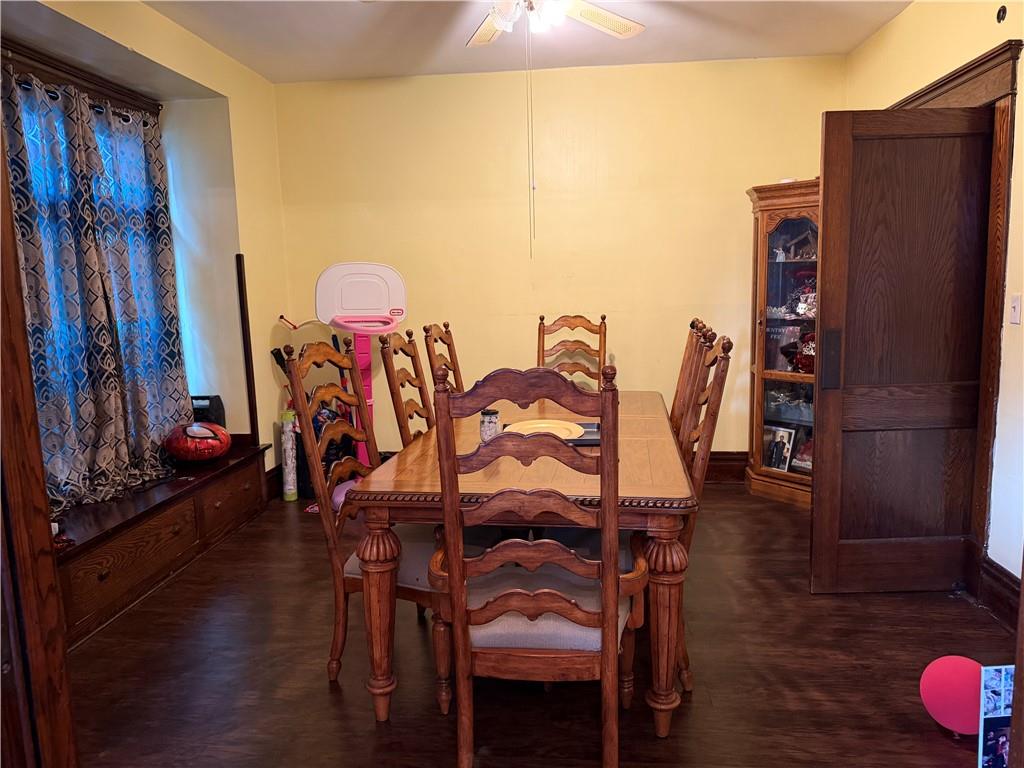 304 Spruce Avenue Sharon, PA 16146 - Photo 5 of 12 a view of a dining room with furniture and wooden floor