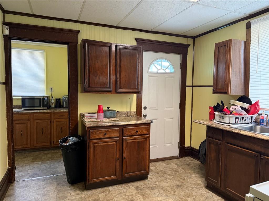 304 Spruce Avenue Sharon, PA 16146 - Photo 7 of 12 a kitchen with sink cabinets and appliances