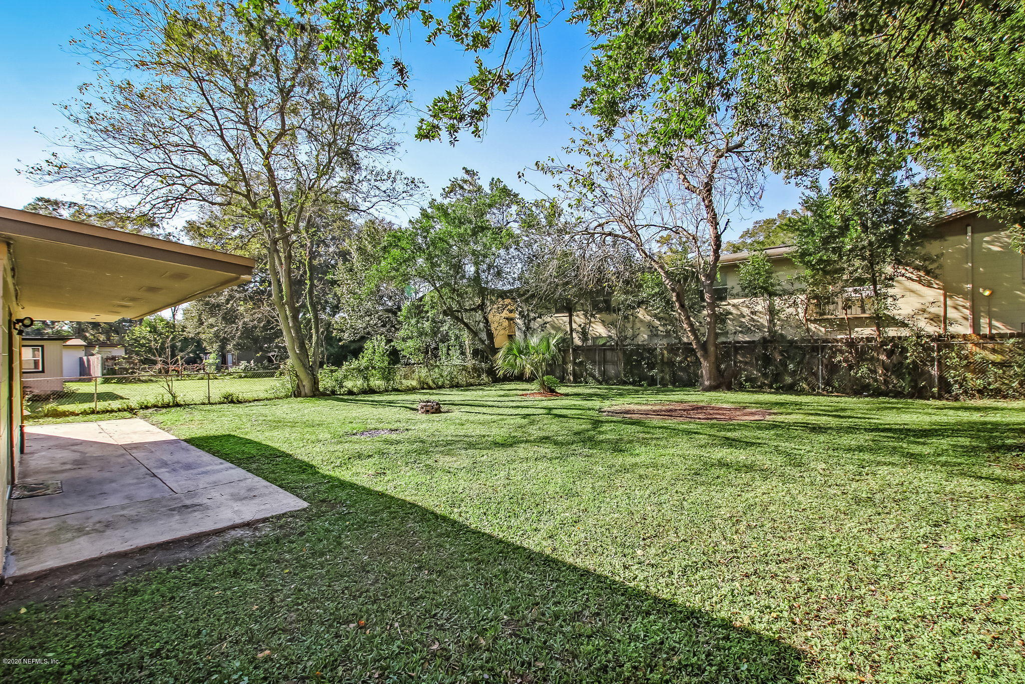 6815 King Arthur Road Jacksonville, FL 32211 - Photo 32 of 32 a view of a park with large trees