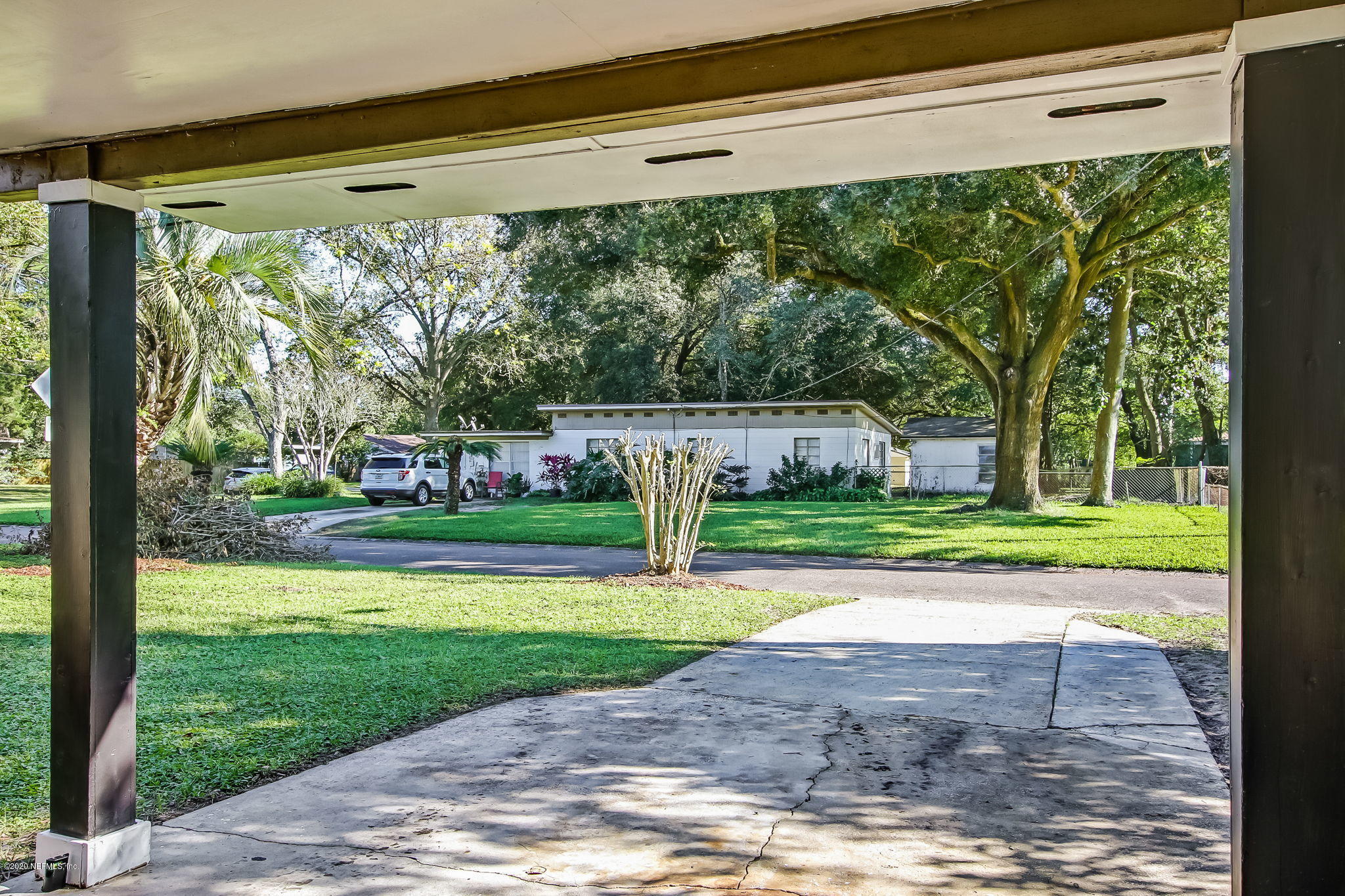 6815 King Arthur Road Jacksonville, FL 32211 - Photo 6 of 32 a view of swimming pool with a yard