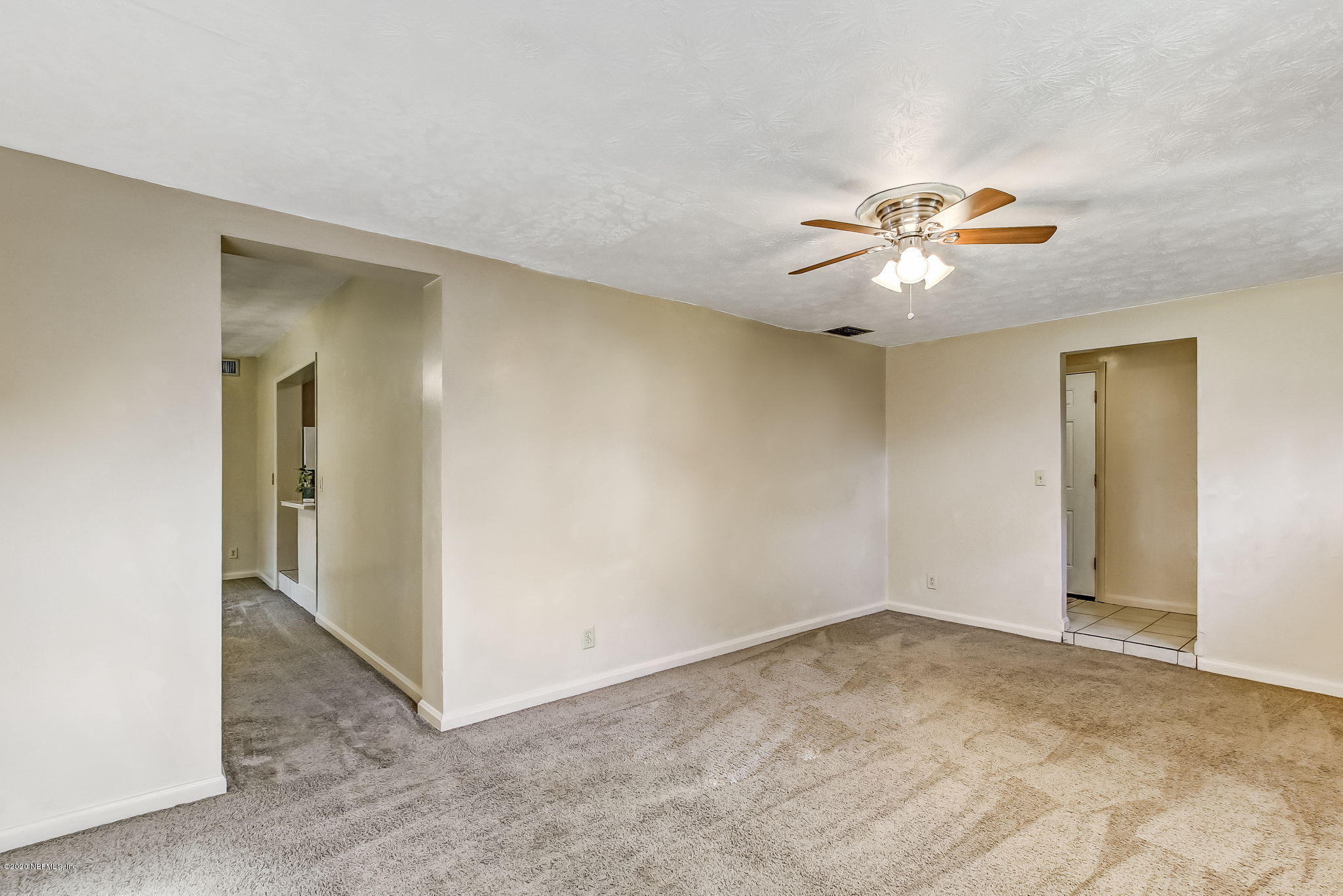 6815 King Arthur Road Jacksonville, FL 32211 - Photo 8 of 32 wooden floor in an empty room
