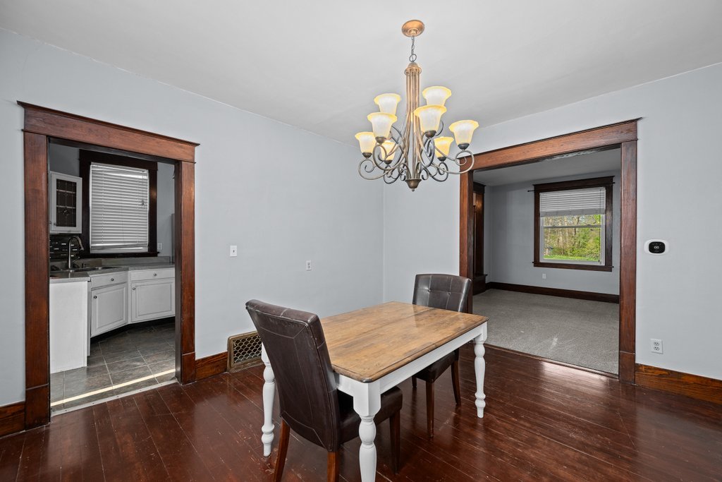1179 26th Street Moline, IL 61265 - Photo 10 of 34 a view of a dining room with furniture and wooden floor