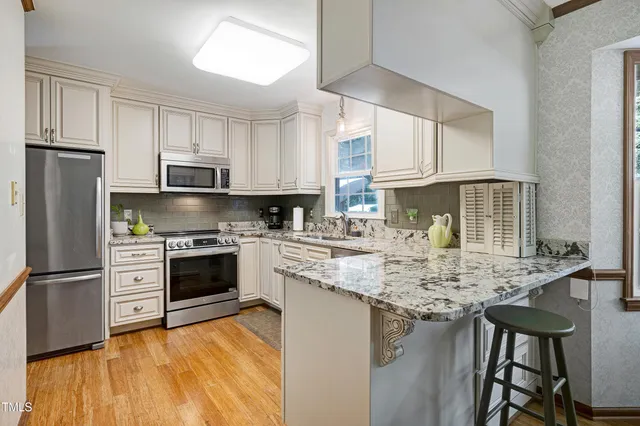 a dining room with furniture window wooden floor