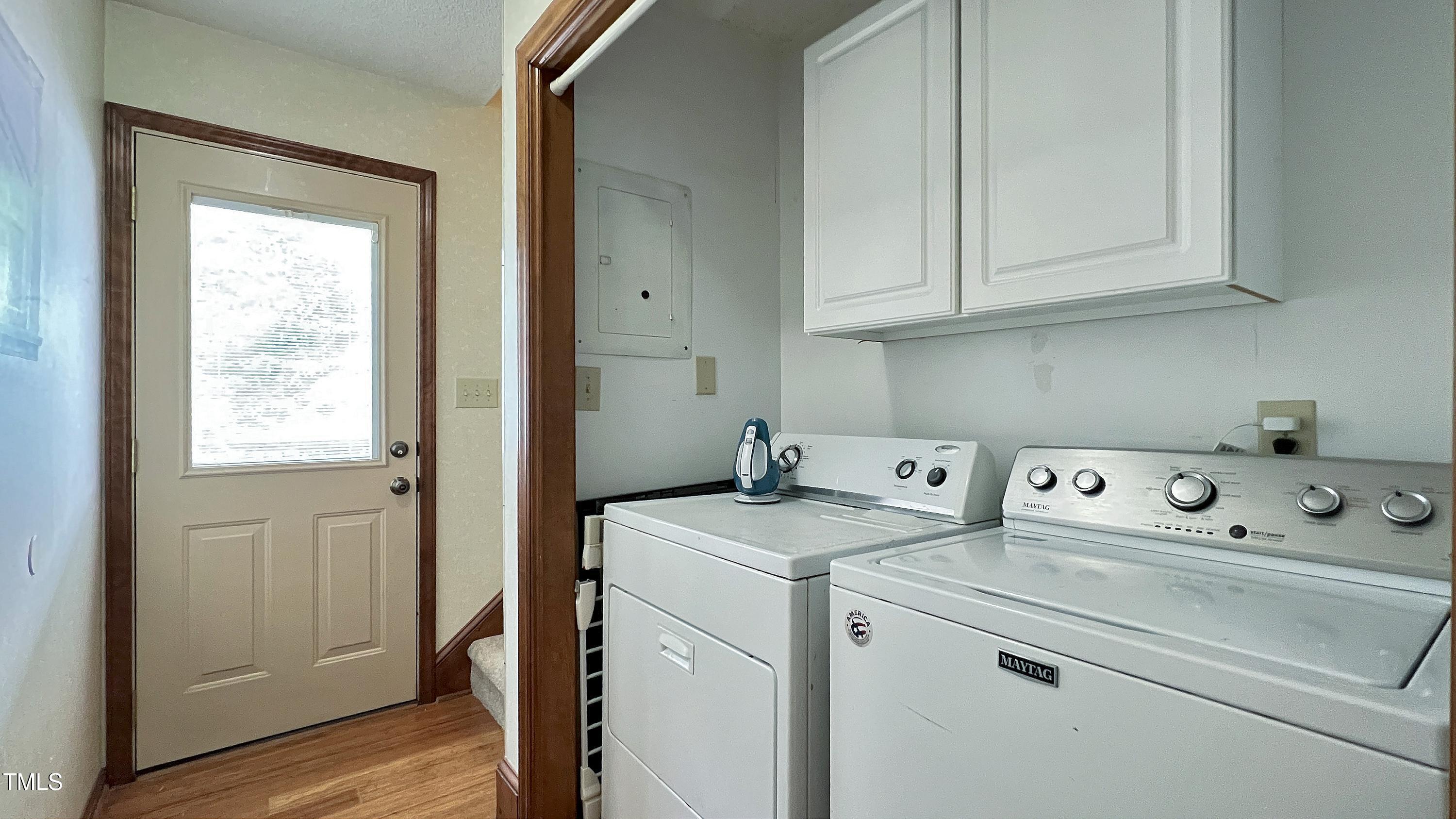 6309 Windy Ridge Court Raleigh, NC 27606 - Photo 16 of 53 a utility room with dryer and washer