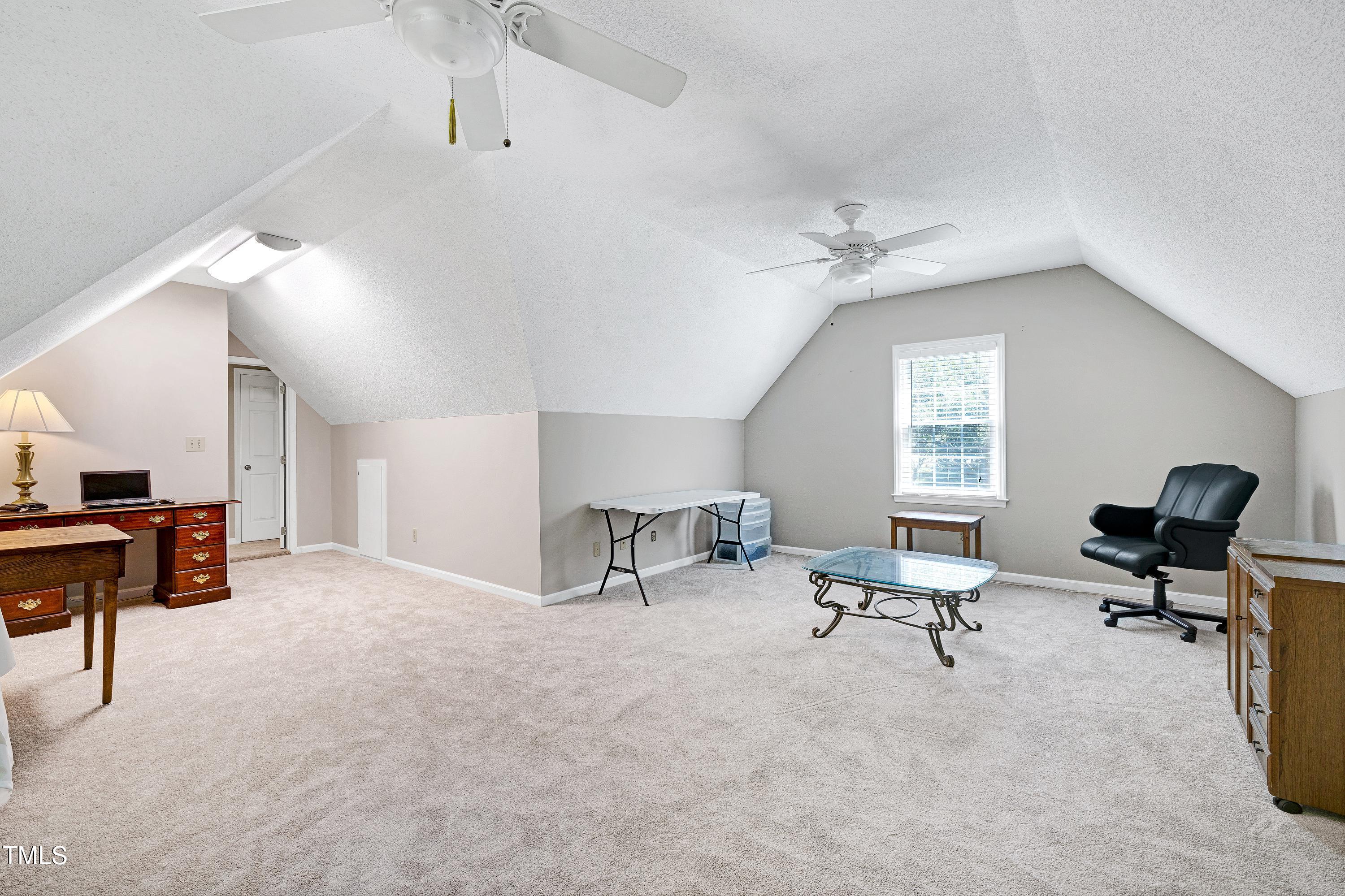 6309 Windy Ridge Court Raleigh, NC 27606 - Photo 28 of 53 a view of workspace with furniture and a window
