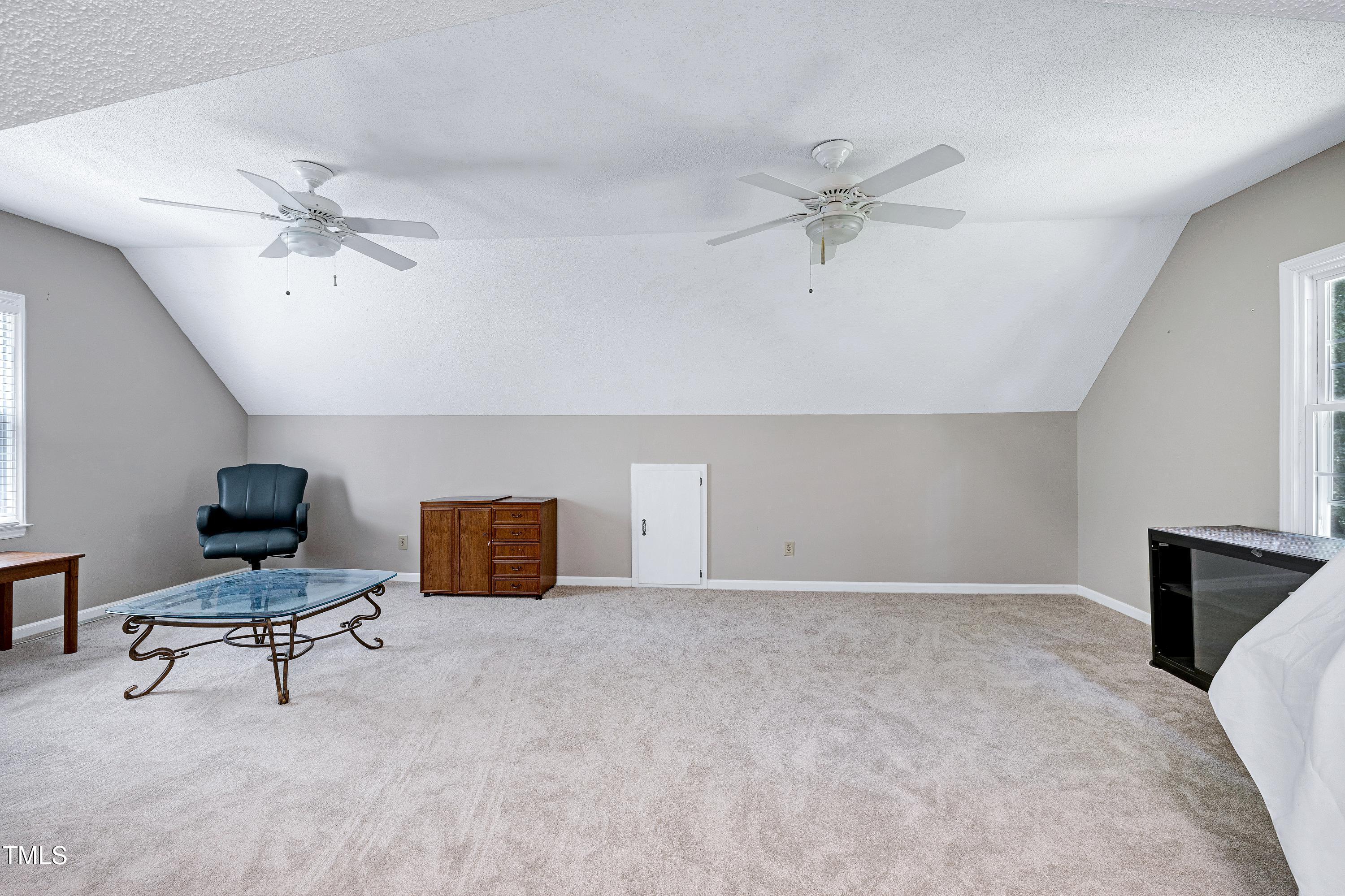 6309 Windy Ridge Court Raleigh, NC 27606 - Photo 30 of 53 a living room with furniture