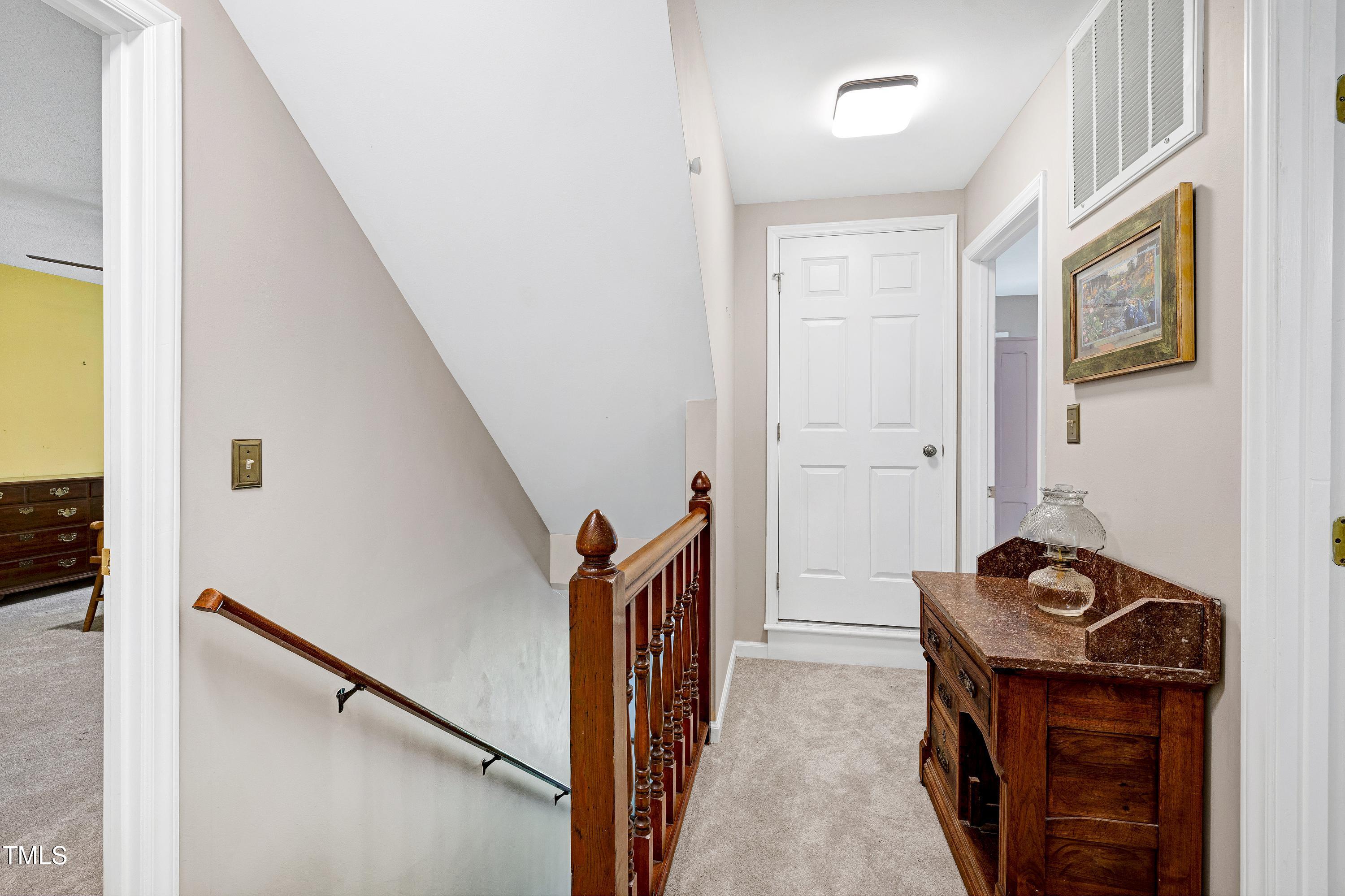 6309 Windy Ridge Court Raleigh, NC 27606 - Photo 33 of 53 a view of front door and hallway