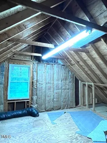 a view of backyard with hardwood and furniture