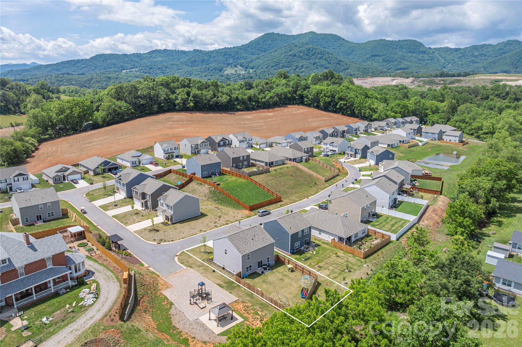 8 Madelyn Drive Clyde, NC 28721 - Photo 35 of 43 an aerial view of residential house with outdoor space