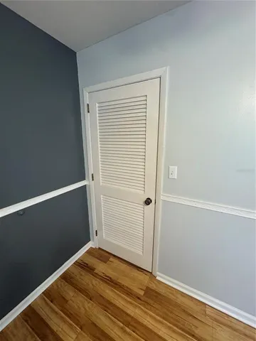 a bathroom with a sink a toilet a mirror and vanity