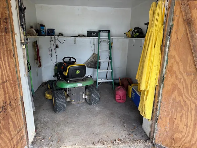 a view of living room with furniture and a flat screen tv