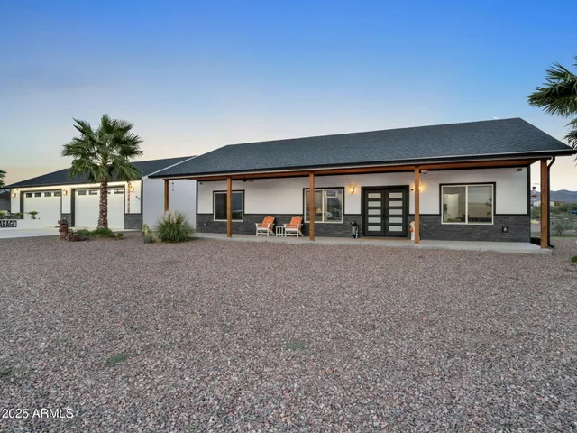 a view of a house with a street