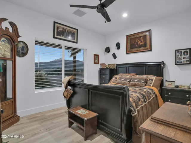 a kitchen with white cabinets and a stove