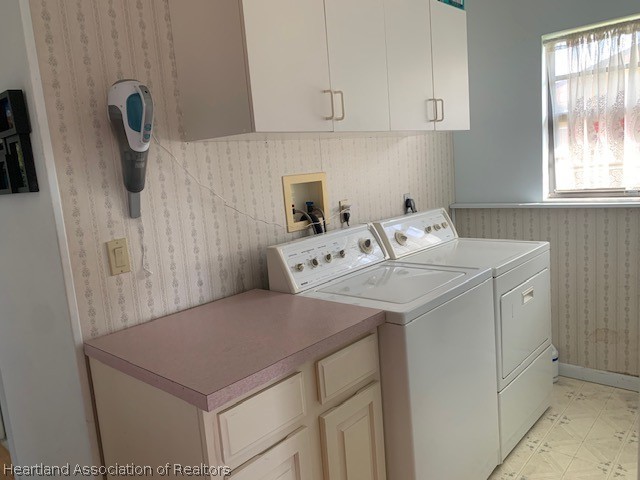 108 Lime Road Northeast Lake Placid, FL 33852 - Photo 12 of 17 a utility room with dryer and washer