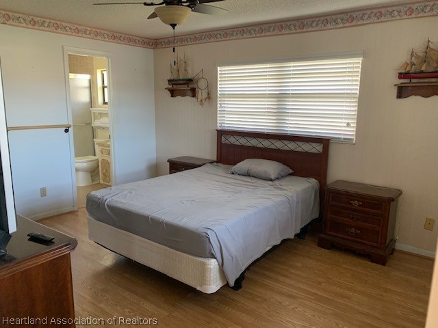 108 Lime Road Northeast Lake Placid, FL 33852 - Photo 17 of 17 a bedroom with a bed and a window