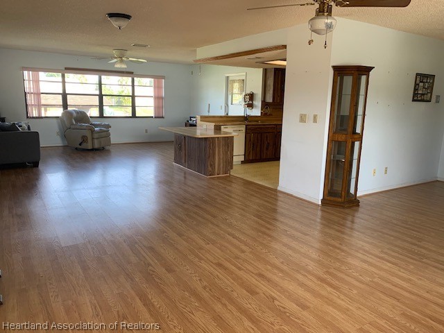 108 Lime Road Northeast Lake Placid, FL 33852 - Photo 6 of 17 an empty room with wooden floor and windows