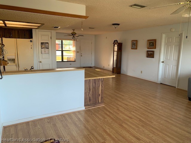 108 Lime Road Northeast Lake Placid, FL 33852 - Photo 8 of 17 a view of a kitchen with wooden floor and staircase