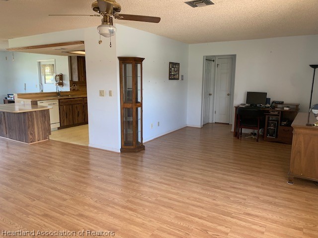 108 Lime Road Northeast Lake Placid, FL 33852 - Photo 10 of 17 a view of empty room with wooden floor and furniture