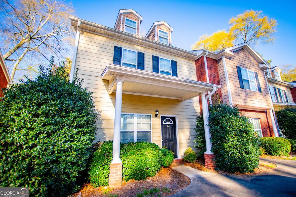 145 Bowen Street, Unit B4 Carrollton, GA 30117 - Photo 1 of 1 front view of a house