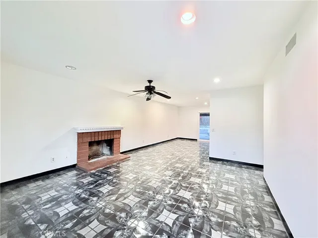 a view of a livingroom with a fireplace