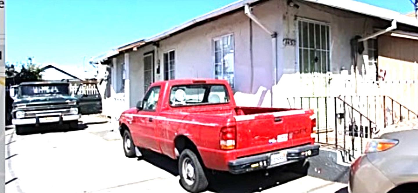 1453 74th Avenue Oakland, CA 94621 - Photo 1 of 1 a front view of a house with a front door