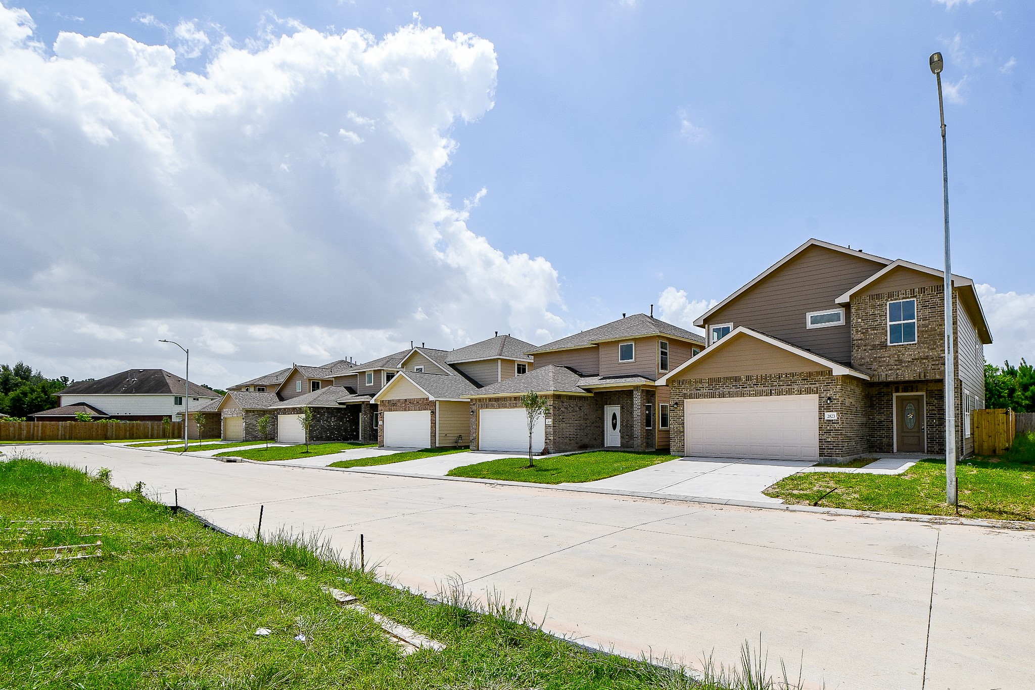 a house with swimming pool in front of it