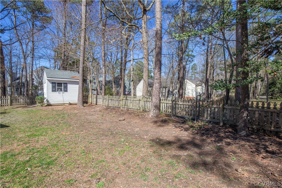 5803 Mill Spring Lane Midlothian, VA 23112 - Photo 5 of 21 backyard and storage shed