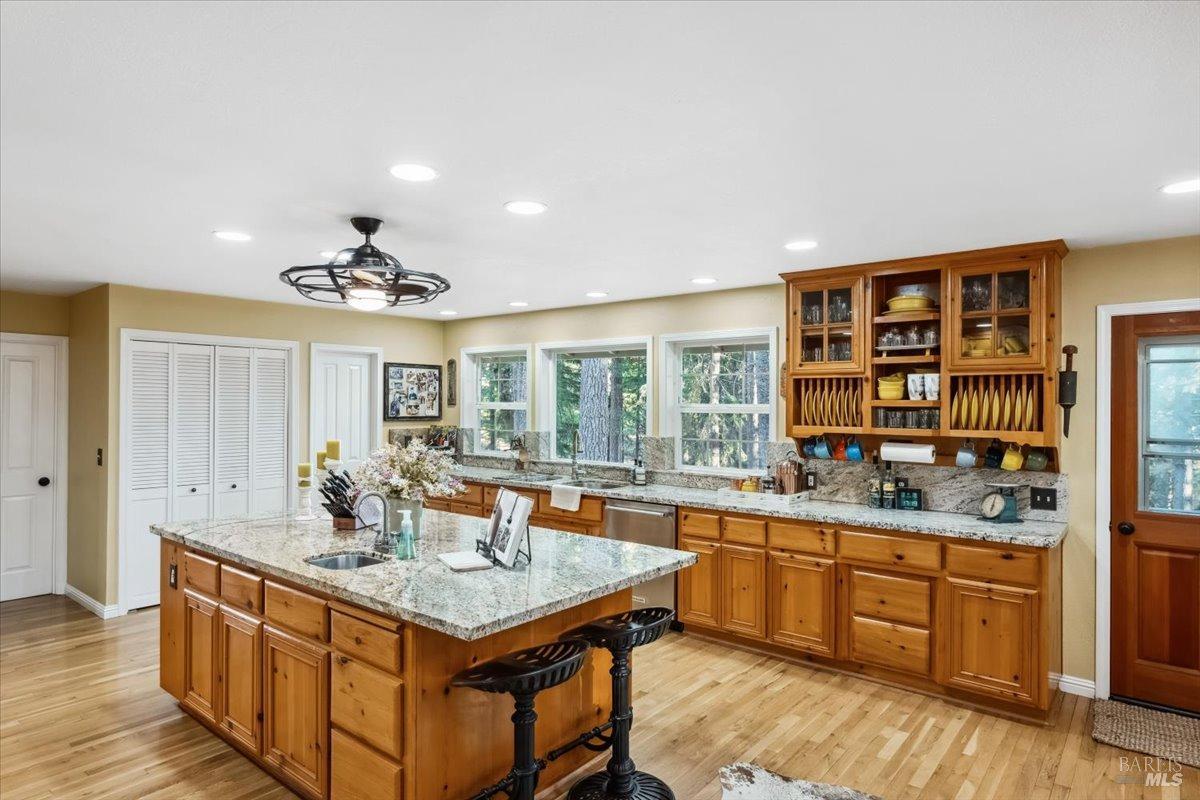 5701 Ridgewood Road Willits, CA 95490 - Photo 18 of 84 a kitchen with a stove a sink and a refrigerator